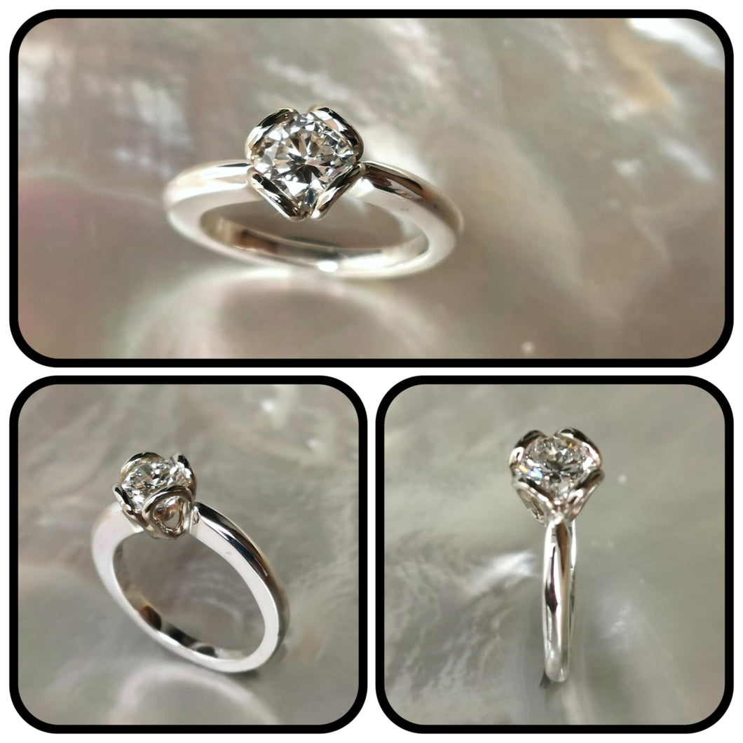 Solitaire 1 carat serti fleur